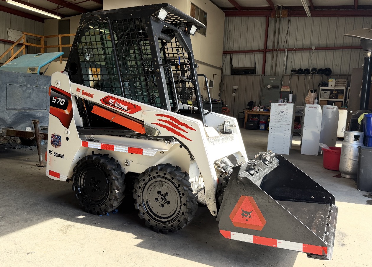 Bobcat S70 compact skid steer serviced by LA Trucks and Tractors