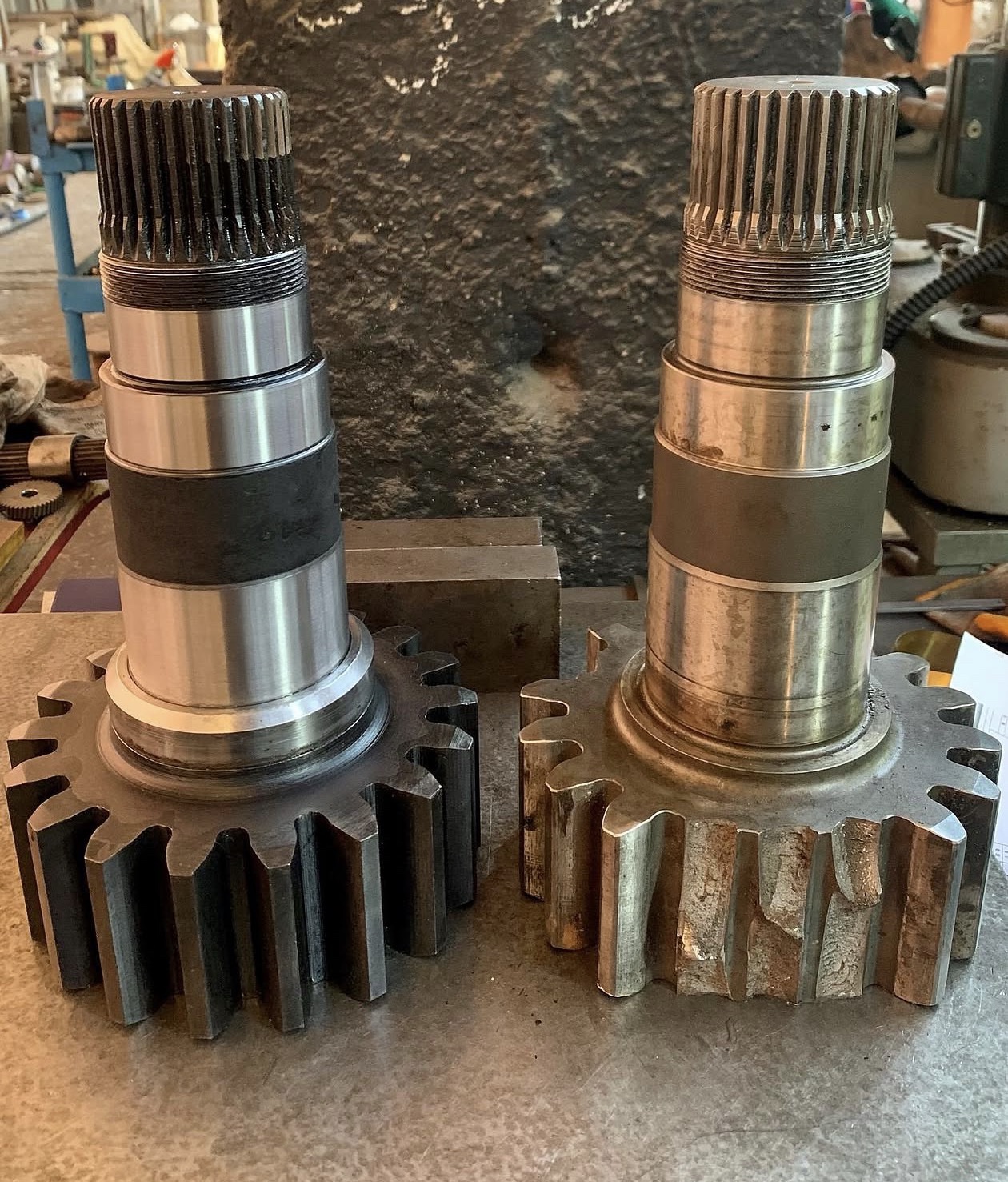 New and worn gear shafts shown side by side
