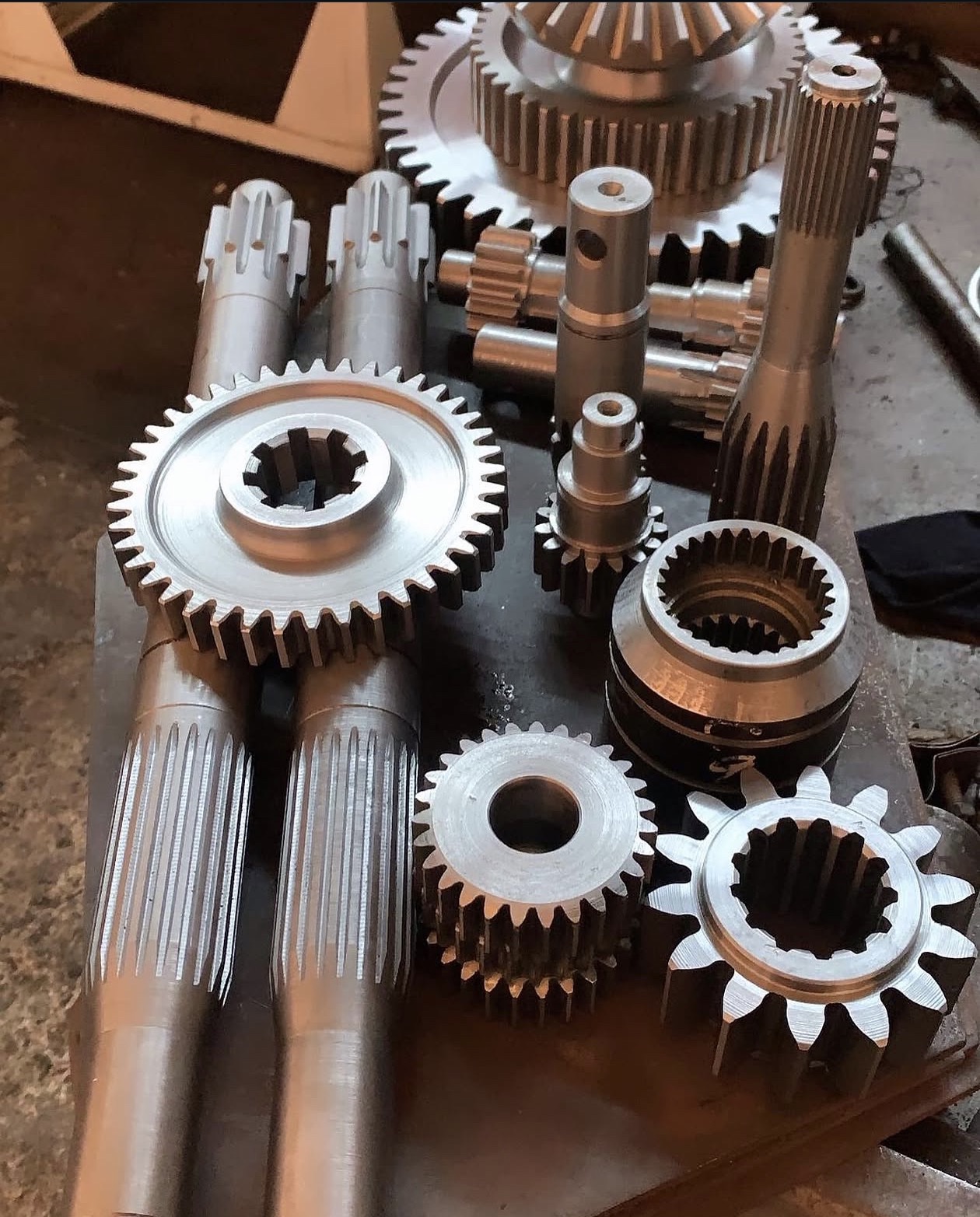Precision-machined gears, pinions and shafts