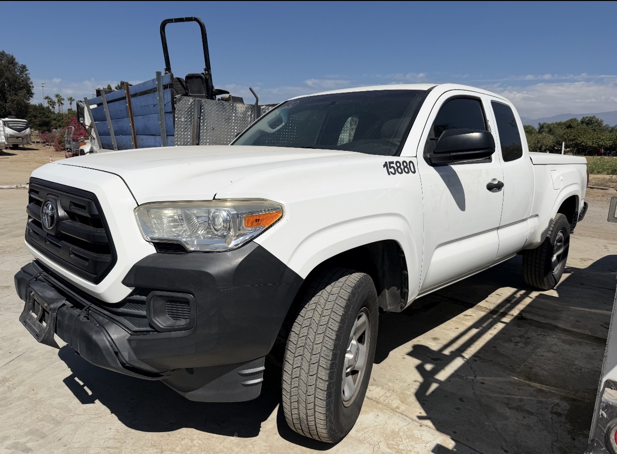 White Toyota Tacoma representing the pickup trucks purchased nationwide